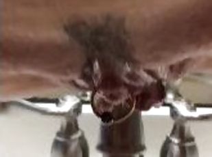 swinginmilf uses a sink to drain her sweet pussy of piss