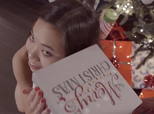 Seductive moments of Christmas sex for this petite Asian hon
