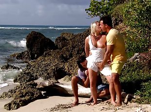 Ellen Saint has a bladt being fucked on a beach by two studs