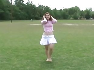 Beautiful dame playing outdoors needs a man to take her over