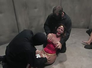 Isis Love gets her mouth and vag fucked by two studs in BDSM scene