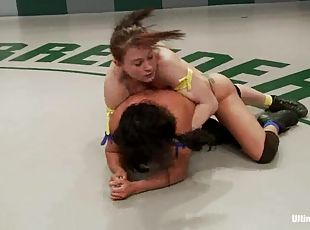 Horny girls in bikini wrestle in a ring and lick pussies