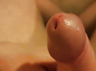 Playing with my uncut cock in the bath