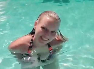 Wet blonde hottie working boobs in the pool