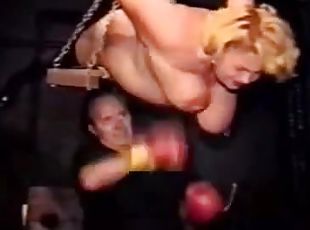 Boxing this sexy milf's tits having her hanged up