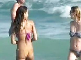 Jessica Alba wearing a purple bikini gets caught on voyeur's cam on...
