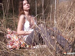 Horny and salacious teen removes her pants and toy fucks warmly in this outdoors scene
