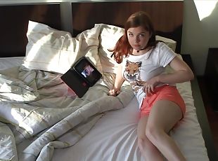 Brown-haired babe masturbates next to her laptop
