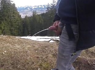 While hiking in the mountains I had to piss, then I jerked my cock ...