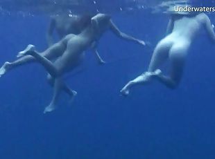 Two foxy slim stunners enjoy revealing their bodies in the ocean