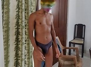 Sri Lankan Hot boy undressing to watch gay porn and cum