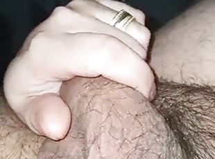 Stepmoms hand slides on her stepsons cock while he watches some por...