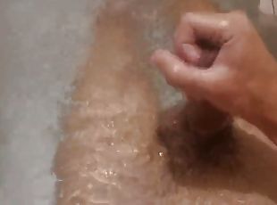 Skinny twink cums in the bath while showering... He leaves it all covered in cum