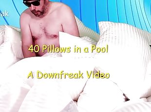 Pillow fucks 40 pillows in an inflatable pool