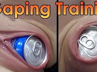 My wife trains  stretching her pussy with soda can and coffee can