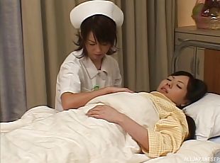 Naughty Japanese nurse seduces her patient into a heated lesbians a...