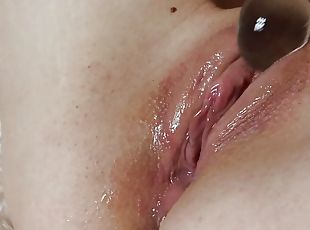 I'm doing it with my Dildo and Squirting and it Squirts so Del...