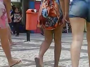 Girl with beautiful legs gets caught on a hidden cam in the street