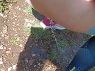my milf friend takes a good piss while walking in the woods - ita a...