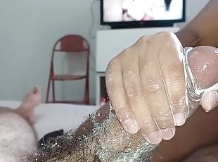 myhand slides on the bastards dick in a strong and naughty handjob,he reigns cum watching dirty porn