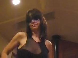 Masked milf dances and plays with her pussy