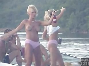 Shooting video of sexy chicks on the lake