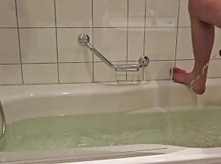 Pissing in the tub before a bath and jerking off