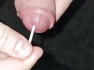 Playing with some Q-Tips, accidentaly inserting them into my cock, ...