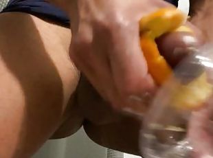 Errand girl Kimora Creams preparing freshly squeezed Orange Juice f...