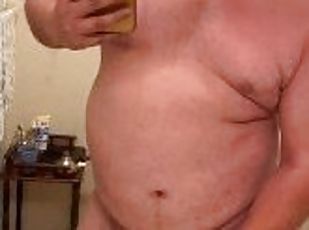 Chubby guy cumshot after shower