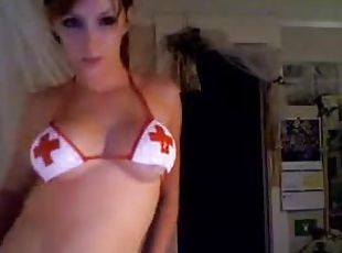 Horny chick dancing in hot and naughty nurse costume
