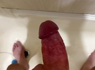 The guy quickly jerked off his big uncut dick in the bathroom and c...