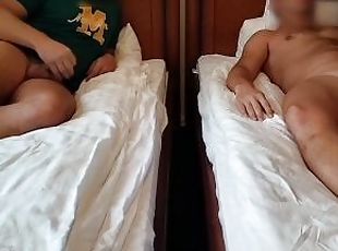 in a hotel with two guys I suck and get fucked