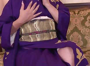 Horny Japanese girl Ryouko Murakami in kimono masturbates with bott...