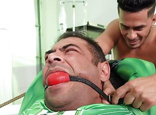 Bdsm ballgagged crossdresser hunk pounded in the infirmary