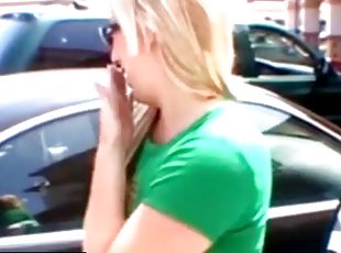 A hot blonde is in the car sucking a small dick