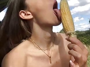 Young slut fucks corn and cum