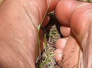 Ebony Feet Playing in the Grass Outside