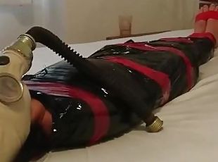 BDSM Slave Girl, plastic mummification with gasmask Breathplay