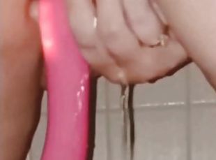 Teen vibrating wet pussy and clit in the sower til she squirts with...