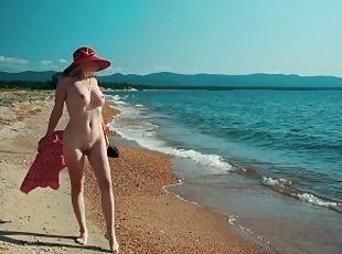 Walking naked on a sandy beach, fucking a huge dildo and having sex...