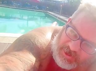 Daddy ejaculates at the Country club pool under his lounge chair wh...