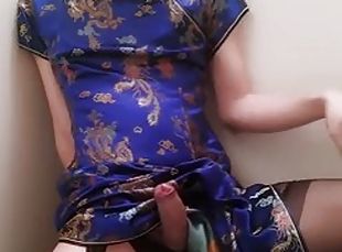 Horny Japanese femboy crossdresser in Chinese dress masturbates and...
