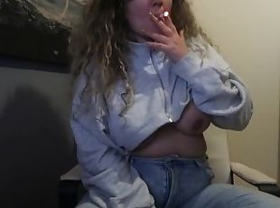 CURVY GIRL with TIGHT JEANS and NATURAL BOOBS SMOKE a CIGARETTE for...