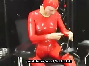 Hot girl full encased in red rubber suit enjoys gas mask breathplay...