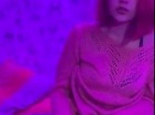Red-haired bitch in a sweater brings herself to orgasm