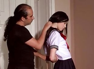 He puts submissive schoolgirl into rope bondage