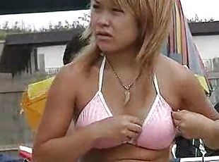 Japanese girls at the beach with big tits