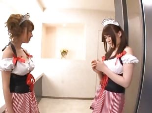 Two busty Japanese bitches enjoy playing with each other's tits