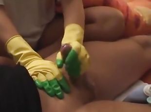 Housewife In Yellow Rubber Gloves Gives Handjob With Oil